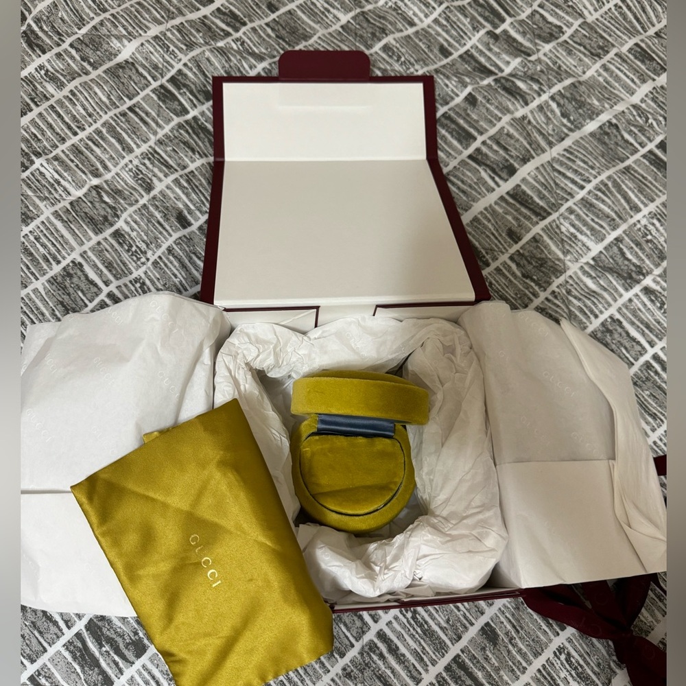 Gucci ring gift box and accessories.
